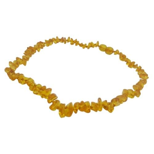 A teething necklace made up of small beads of different shapes. The beads have a golden colour.