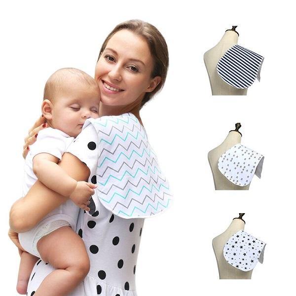 A mom with a Baby Burp Cloth over her sholuder.