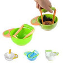 Hand mashing vegetables in the Baby Food Masher & Bowl Set