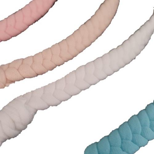 A close up image of 4 braided pacifier clips in blue, white, pink and beige.
