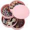 Compact Rotating Jewellery Organizer - Pink. With jewellery inside.