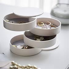Compact Rotating Jewellery Organizer - White. Open with jewllery inside.