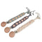 There are 3 crochet dummy clips with wooden beads. There is a light grey, dark grey and natural dummy clip.